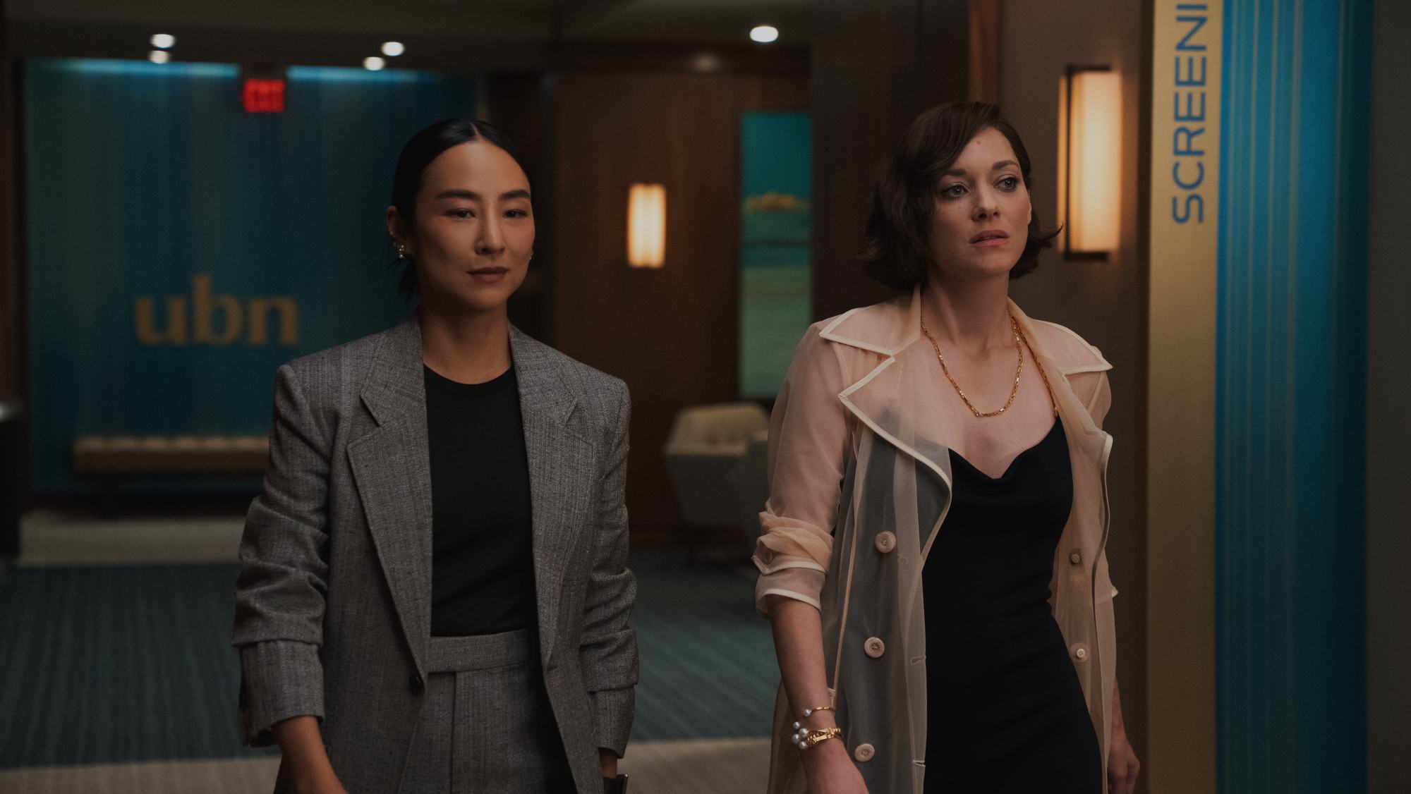 Greta Lee with Marion Cotillard in season four.